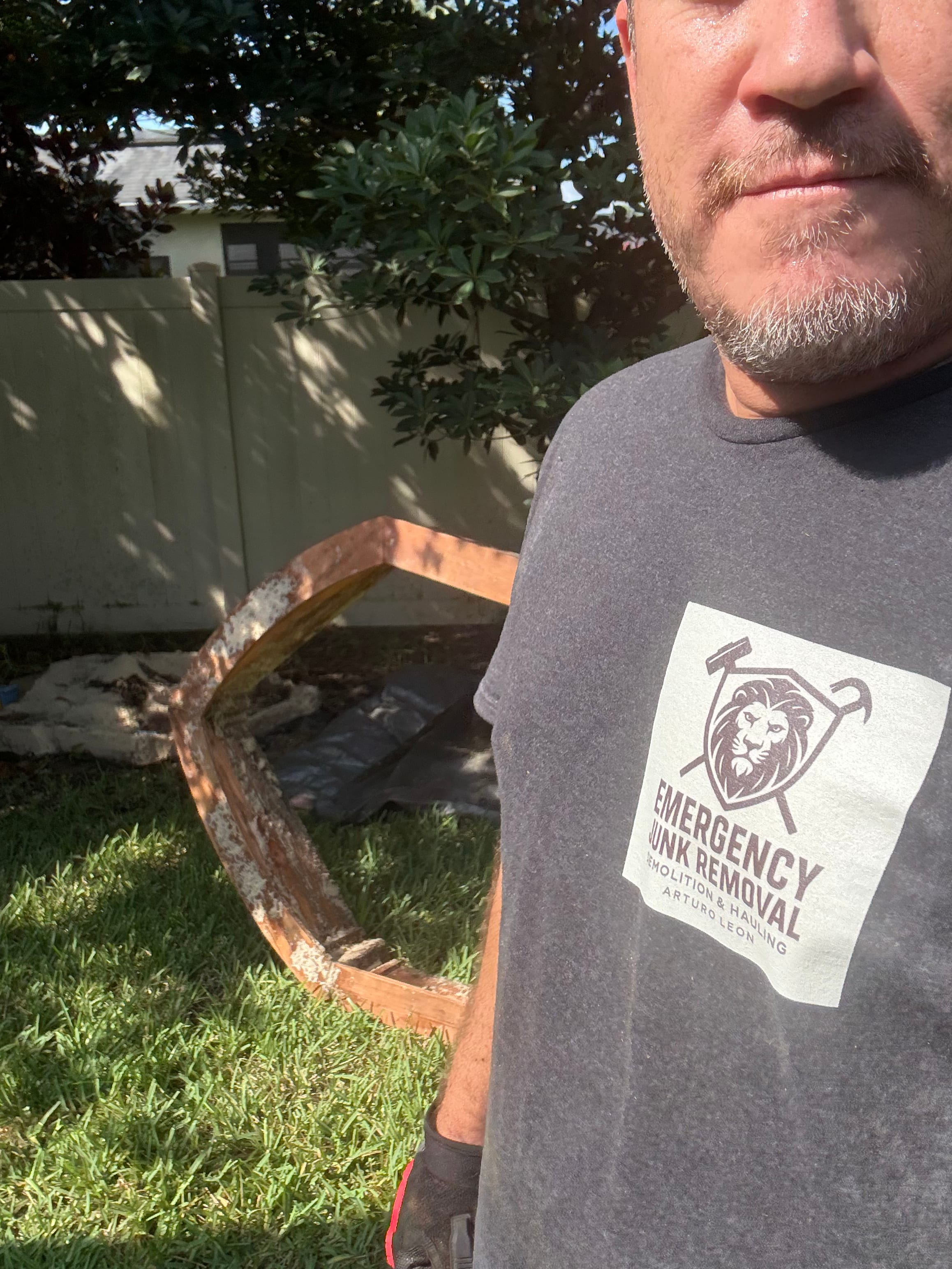 Garage with household debris and items to be removed